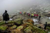 Hampta Pass Trek- Trek guide looking over trekkers as they follow his path